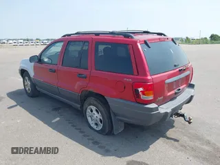 2001 Jeep Grand Cherokee Laredo with VIN 1J4GW48S81C727262, listed as a IAAI auction lot 42402470 with 228,167 mi miles and . Bid and sale history available at DreamBid. Image 3.