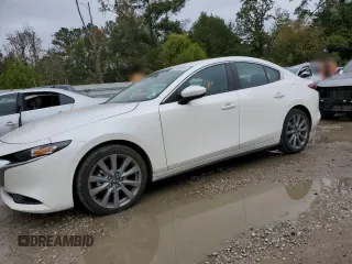 2023 Mazda 3 S Carbon Edition with VIN 3MZBPACM2PM370458, listed as a Copart auction lot 82400504 with 24,460 mi miles and Salvage title. Bid and sale history available at DreamBid. Image 1.