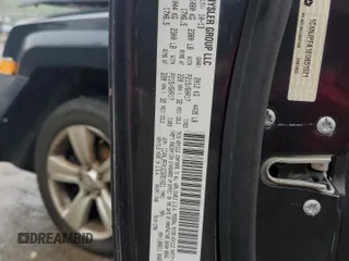 2014 Jeep Patriot Latitude with VIN 1C4NJPFA1ED651021, listed as a Copart auction lot 56947445 with 137,239 mi miles and Salvage title. Bid and sale history available at DreamBid. Image 14.