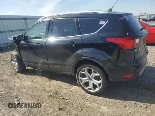 2019 Ford Escape Titanium with VIN 1FMCU0J99KUB10731, listed as a Copart auction lot 53433825 with 152,280 mi miles and Salvage title. Bid and sale history available at DreamBid. Image 2.