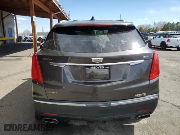 2019 Cadillac XT5 Luxury AWD with VIN 1GYKNDRS0KZ229941, listed as a Copart auction lot 49457315 with 48,856 mi miles and Salvage Title. Bid and sale history available at carsss.com. Image 6.