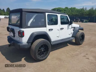 2018 Jeep Wrangler Unlimited Sport S with VIN 1C4HJXDG7JW150038, listed as a IAAI auction lot 42519194 with 113,300 mi miles and . Bid and sale history available at DreamBid. Image 4.