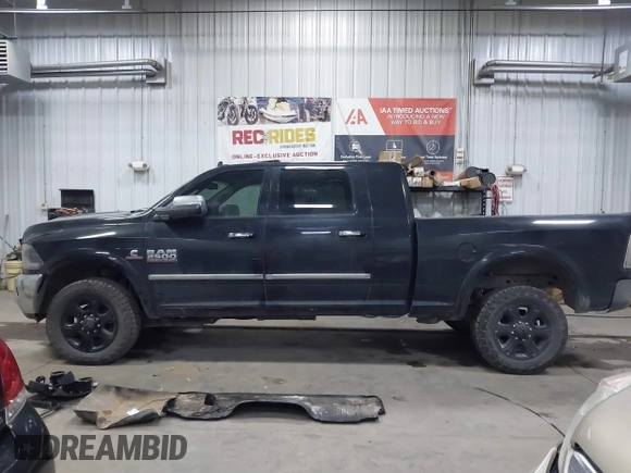 2015 Ram 2500 Laramie with VIN 3C6UR5NL9FG646401, listed as a IAAI auction lot 41104911 with 16,800 mi miles and . Bid and sale history available at DreamBid. Image 15.