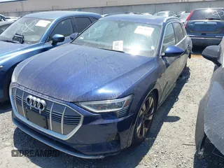 2022 Audi e-tron Premium z VIN WA1AAAGE4NB020119, wystawiony jako IAAI lot #41830433 z przebiegiem 27 591 mil mil oraz . Historia ofert i sprzedaży dostępna na DreamBid. Obrazek 2.