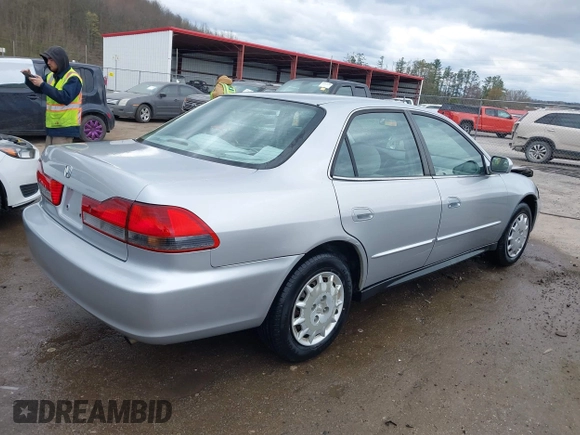 2001 Honda Accord LX z VIN 1HGCG56491A098359, wystawiony jako IAAI lot #42021768 z przebiegiem 122 121 mil mil oraz . Historia ofert i sprzedaży dostępna na DreamBid. Obrazek 4.
