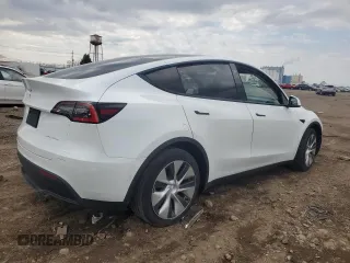 2021 Tesla Model Y Long Range z VIN 5YJYGDEE6MF077764, wystawiony jako Copart lot #53814015 z przebiegiem 87 903 mil mil oraz Szkoda całkowita • Salvage title. Historia ofert i sprzedaży dostępna na DreamBid. Obrazek 3.