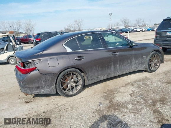 2014 Infiniti Q50 Hybrid Sport with VIN JN1AV7AR7EM703030, listed as a IAAI auction lot 41661844 with 128,202 mi miles. Bid and sale history available at carsss.com. Image 4.