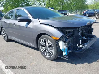 2018 Honda Civic EX-T z VIN 2HGFC1F3XJH644466, wystawiony jako IAAI lot #42197630 z przebiegiem 95 377 mil mil oraz . Historia ofert i sprzedaży dostępna na DreamBid. Obrazek 1.