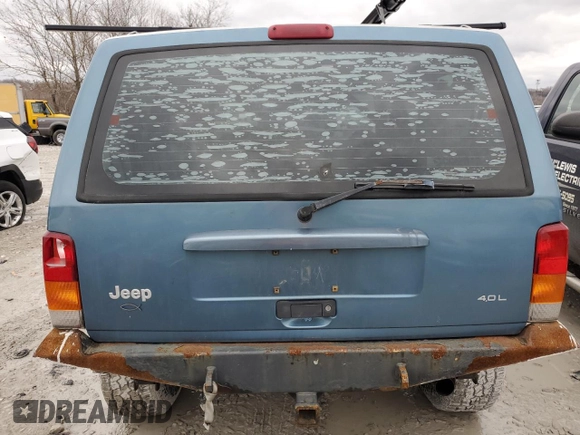 1999 Jeep Cherokee Sport with VIN 1J4FF68S4XL567848, listed as a Copart auction lot 43222045 with 280,178 mi miles and Salvage title. Bid and sale history available at DreamBid. Image 6.
