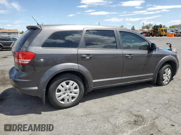 2014 Dodge Journey American Value Pkg with VIN 3C4PDCAB8ET256983, listed as a Copart auction lot 54976545 with 184,764 mi miles and Clean Title. Bid and sale history available at carsss.com. Image 3.