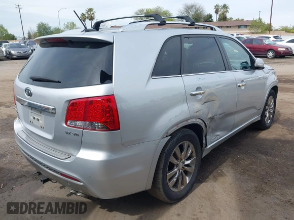 2012 Kia Sorento SX with VIN 5XYKWDA26CG255894, listed as a IAAI auction lot 41827895 with 160,144 mi miles. Bid and sale history available at carsss.com. Image 4.