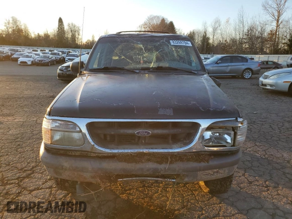 1997 Ford Explorer XL with VIN 1FMDU34E8VUC95969, listed as a Copart auction lot 83269784 with 174,035 mi miles and Salvage title. Bid and sale history available at DreamBid. Image 5.