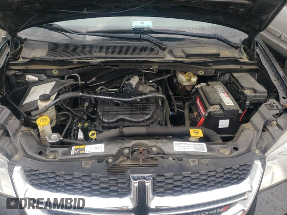 2015 Dodge Grand Caravan SXT with VIN 2C4RDGCG2FR648841, listed as a Copart auction lot 51134455 with 121,570 mi miles and Salvage Title. Bid and sale history available at DreamBid. Image 12.