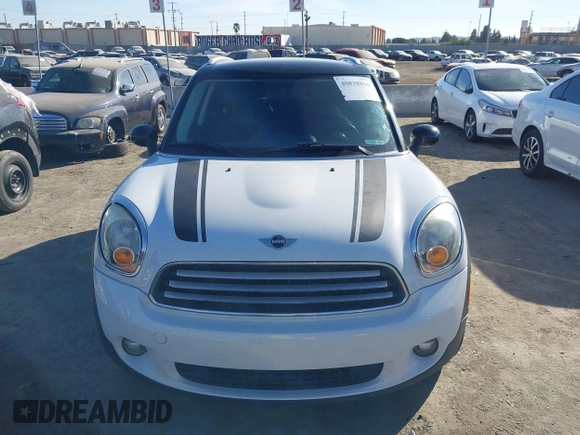 2014 MINI Countryman with VIN WMWZB3C59EWR40065, listed as a IAAI auction lot 40838816 with 80,000 mi miles and . Bid and sale history available at DreamBid. Image 6.