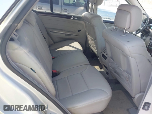 2011 Mercedes-Benz M 350 with VIN 4JGBB8GB4BA664299, listed as a IAAI auction lot 42229734 with 180,557 mi miles and . Bid and sale history available at DreamBid. Image 8.