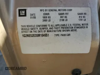 2005 Pontiac Grand Am SE with VIN 1G2NE52E35M184951, listed as a Copart auction lot 43535405 with 215,584 mi miles and Salvage Title. Bid and sale history available at carsss.com. Image 14.