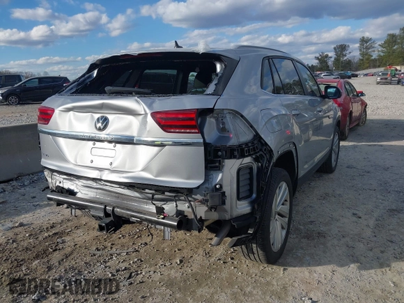 2021 Volkswagen Atlas SE with VIN 1V2JE2CA9MC224456, listed as a IAAI auction lot 41427604 with 24,803 mi miles and . Bid and sale history available at DreamBid. Image 4.