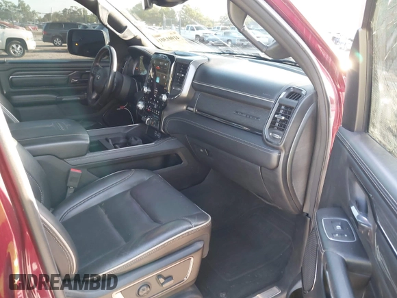 2023 Ram 1500 Limited with VIN 1C6SRFHT7PN541034, listed as a IAAI auction lot 41901301 with 44,190 mi miles and . Bid and sale history available at DreamBid. Image 5.