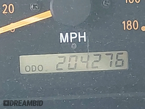 2000 Toyota Tundra SR5 with VIN 5TBRT3411YS070241, listed as a IAAI auction lot 41785990 with 204,276 mi miles and . Bid and sale history available at DreamBid. Image 15.