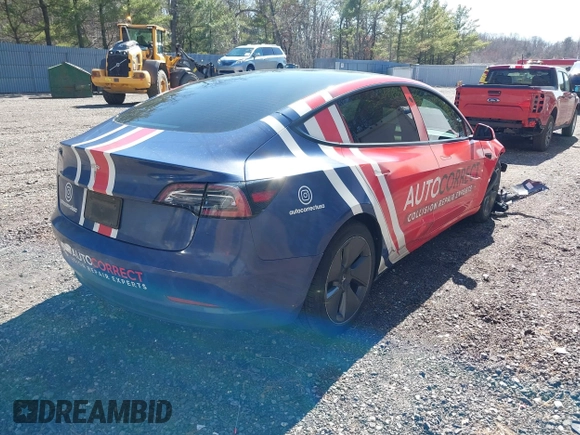 2022 Tesla Model 3 with VIN 5YJ3E1EA5NF168201, listed as a IAAI auction lot 41855273 with 31,393 mi miles and . Bid and sale history available at DreamBid. Image 4.