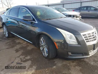 2013 Cadillac XTS with VIN 2G61N5S34D9231315, listed as a IAAI auction lot 41092660 with 206,093 mi miles. Bid and sale history available at carsss.com. Image 1.