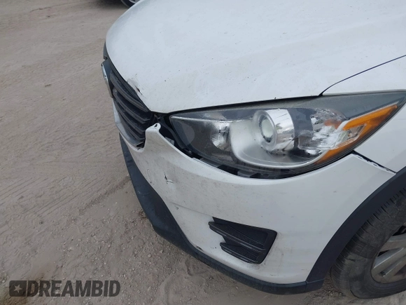 2016 Mazda CX-5 Sport with VIN JM3KE2BY1G0875484, listed as a IAAI auction lot 41838122 with 166,986 mi miles. Bid and sale history available at carsss.com. Image 18.