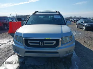 2009 Honda Ridgeline RTL with VIN 2HJYK16569H002832, listed as a IAAI auction lot 41683669 with 154,220 mi miles and . Bid and sale history available at DreamBid. Image 6.