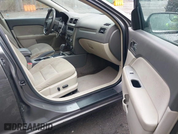 2012 Ford Fusion Hybrid with VIN 3FADP0L34CR215667, listed as a IAAI auction lot 41957936 with 158,914 mi miles and . Bid and sale history available at DreamBid. Image 5.