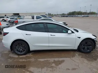 2021 Tesla Model 3 Long Range with VIN 5YJ3E1EB3MF059713, listed as a IAAI auction lot 41778289 with 52,211 mi miles. Bid and sale history available at carsss.com. Image 14.
