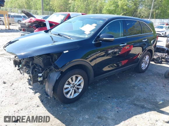 2019 Kia Sorento L with VIN 5XYPG4A38KG574269, listed as a IAAI auction lot 42003610 with 129,896 mi miles and . Bid and sale history available at DreamBid. Image 2.