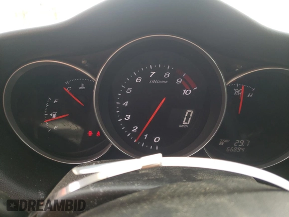 2005 Mazda RX-8 with VIN JM1FE173050145886, listed as a Copart auction lot 71110404 with 66,894 mi miles and Salvage Title. Bid and sale history available at carsss.com. Image 9.