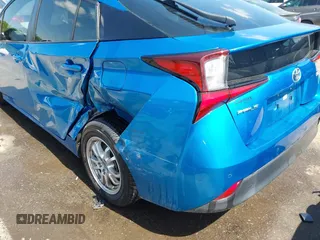 2020 Toyota Prius L Eco with VIN JTDKARFUXL3118354, listed as a IAAI auction lot 41991337 with 83,030 mi miles and . Bid and sale history available at DreamBid. Image 17.
