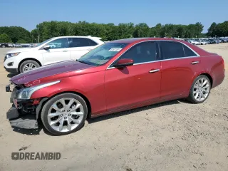2014 Cadillac CTS Performance RWD with VIN 1G6AS5SX4E0170197, listed as a Copart auction lot 61601304 with 148,354 mi miles and Salvage title. Bid and sale history available at DreamBid. Image 1.
