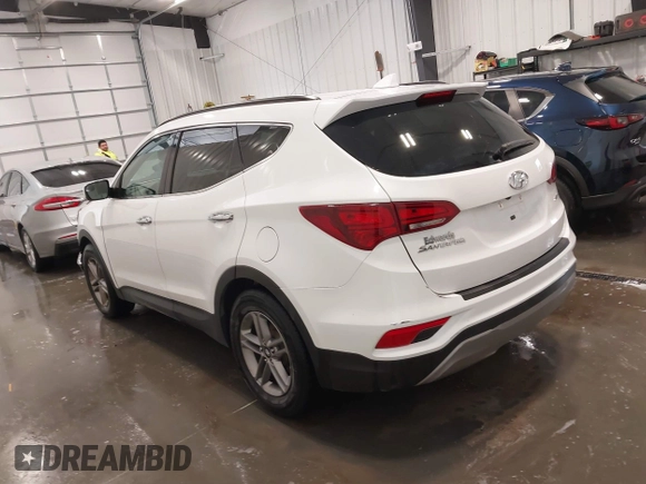 2017 Hyundai Santa Fe 2.4L z VIN 5XYZU3LBXHG444308, wystawiony jako IAAI lot #41685902 z przebiegiem 70 838 mil mil oraz . Historia ofert i sprzedaży dostępna na DreamBid. Obrazek 3.