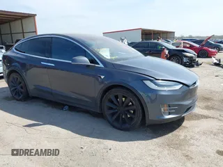 2017 Tesla Model X 90D with VIN 5YJXCBE22HF079194, listed as a IAAI auction lot 41895591 with 102,437 mi miles and . Bid and sale history available at DreamBid. Image 1.