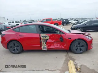 2023 Tesla Model 3 Long Range with VIN 5YJ3E1EB6PF388801, listed as a IAAI auction lot 41610678 with 20,144 mi miles and . Bid and sale history available at DreamBid. Image 14.