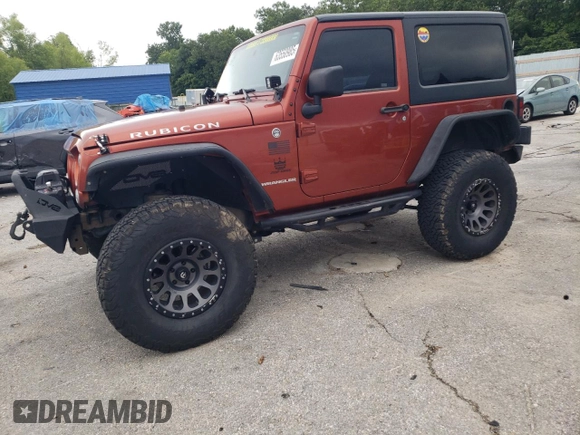 2014 Jeep Wrangler Rubicon with VIN 1C4BJWCG2EL303420, listed as a Copart auction lot 63550985 with 87,175 mi miles and Salvage title. Bid and sale history available at DreamBid. Image 1.
