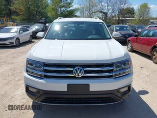 2018 Volkswagen Atlas SE with VIN 1V2KR2CAXJC586848, listed as a IAAI auction lot 42200959 with 96,336 mi miles and . Bid and sale history available at DreamBid. Image 13.