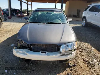 2002 Mazda 626 LX with VIN 1YVGF22C225302664, listed as a Copart auction lot 72603264 with 88,876 mi miles and Salvage Title. Bid and sale history available at carsss.com. Image 5.