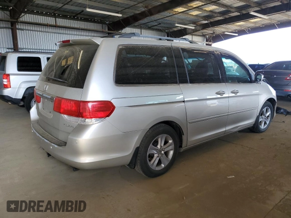 2008 Honda Odyssey Touring with VIN 5FNRL38998B052646, listed as a Copart auction lot 58357145 with 200,943 mi miles and Salvage title. Bid and sale history available at DreamBid. Image 3.