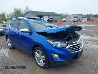 2019 Chevrolet Equinox Premier z VIN 3GNAXNEV1KS554751, wystawiony jako IAAI lot #42191370 z przebiegiem 106 389 mil mil oraz . Historia ofert i sprzedaży dostępna na DreamBid. Obrazek 1.