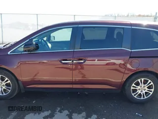 2012 Honda Odyssey EX with VIN 5FNRL5H42CB136915, listed as a IAAI auction lot 41972714 with 211,729 mi miles and . Bid and sale history available at carsss.com. Image 14.