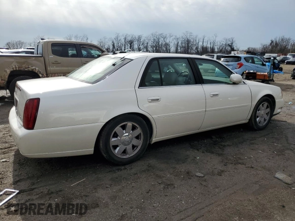 2003 Cadillac DeVille DTS z VIN 1G6KF57993U201484, wystawiony jako Copart lot #43742375 z przebiegiem 53 478 mil mil oraz Szkody całkowita. Historia ofert i sprzedaży dostępna na DreamBid. Obrazek 3.
