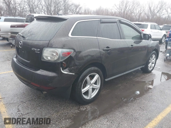2010 Mazda CX-7 Grand Touring z VIN JM3ER4W32A0338657, wystawiony jako IAAI lot #41207462 z przebiegiem 257 713 mil mil oraz . Historia ofert i sprzedaży dostępna na DreamBid. Obrazek 4.