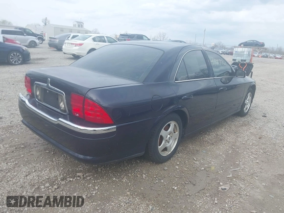 2000 Lincoln LS with VIN 1LNHM87A6YY879355, listed as a IAAI auction lot 41917760 with 70,457 mi miles. Bid and sale history available at carsss.com. Image 4.