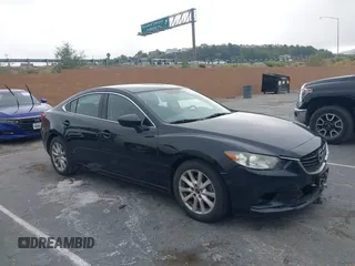 2015 Mazda 6 i Sport with VIN JM1GJ1U5XF1186883, listed as a IAAI auction lot 42564843 with 71,578 mi miles and . Bid and sale history available at DreamBid. Image 1.