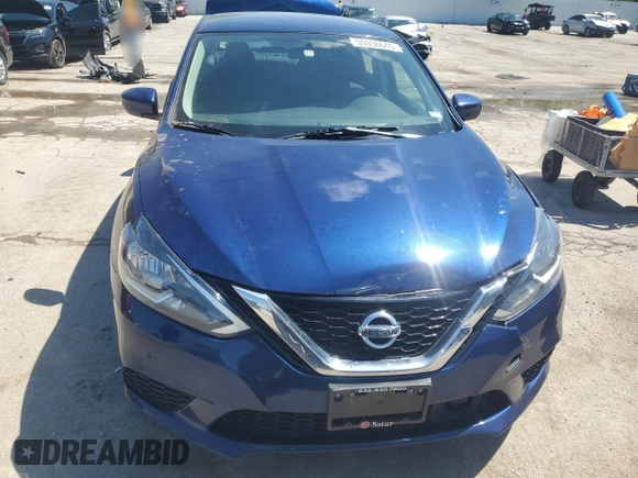 2019 Nissan Sentra S z VIN 3N1AB7AP6KY304884, wystawiony jako Copart lot #55938645 z przebiegiem 70 657 mil mil oraz Szkoda całkowita • Salvage title. Historia ofert i sprzedaży dostępna na DreamBid. Obrazek 5.