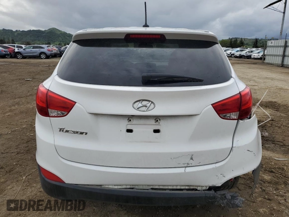 2015 Hyundai Tucson GLS with VIN KM8JT3AF0FU039863, listed as a Copart auction lot 51347815 with 104,469 mi miles and Salvage Title. Bid and sale history available at DreamBid. Image 6.