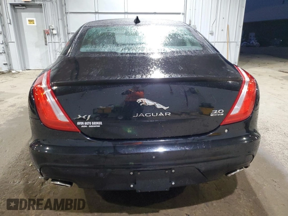 2016 Jaguar XJ R-Sport with VIN SAJWJ1CDXG8V99210, listed as a Copart auction lot 82693224 with 81,978 mi miles and Salvage title. Bid and sale history available at DreamBid. Image 6.