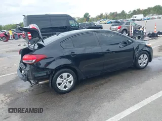 2017 Kia Forte LX with VIN 3KPFK4A70HE099395, listed as a IAAI auction lot 40433686 with 120,337 mi miles. Bid and sale history available at carsss.com. Image 4.
